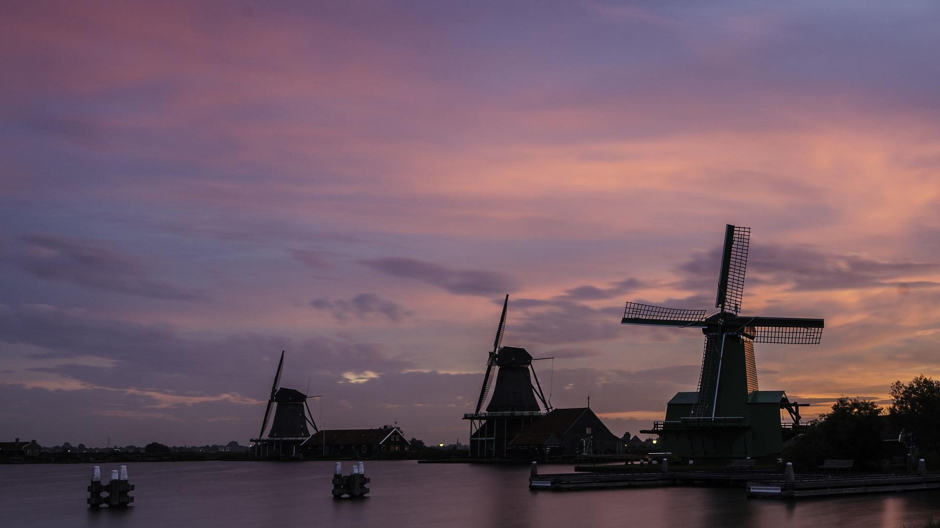 view of the windmills at sunset