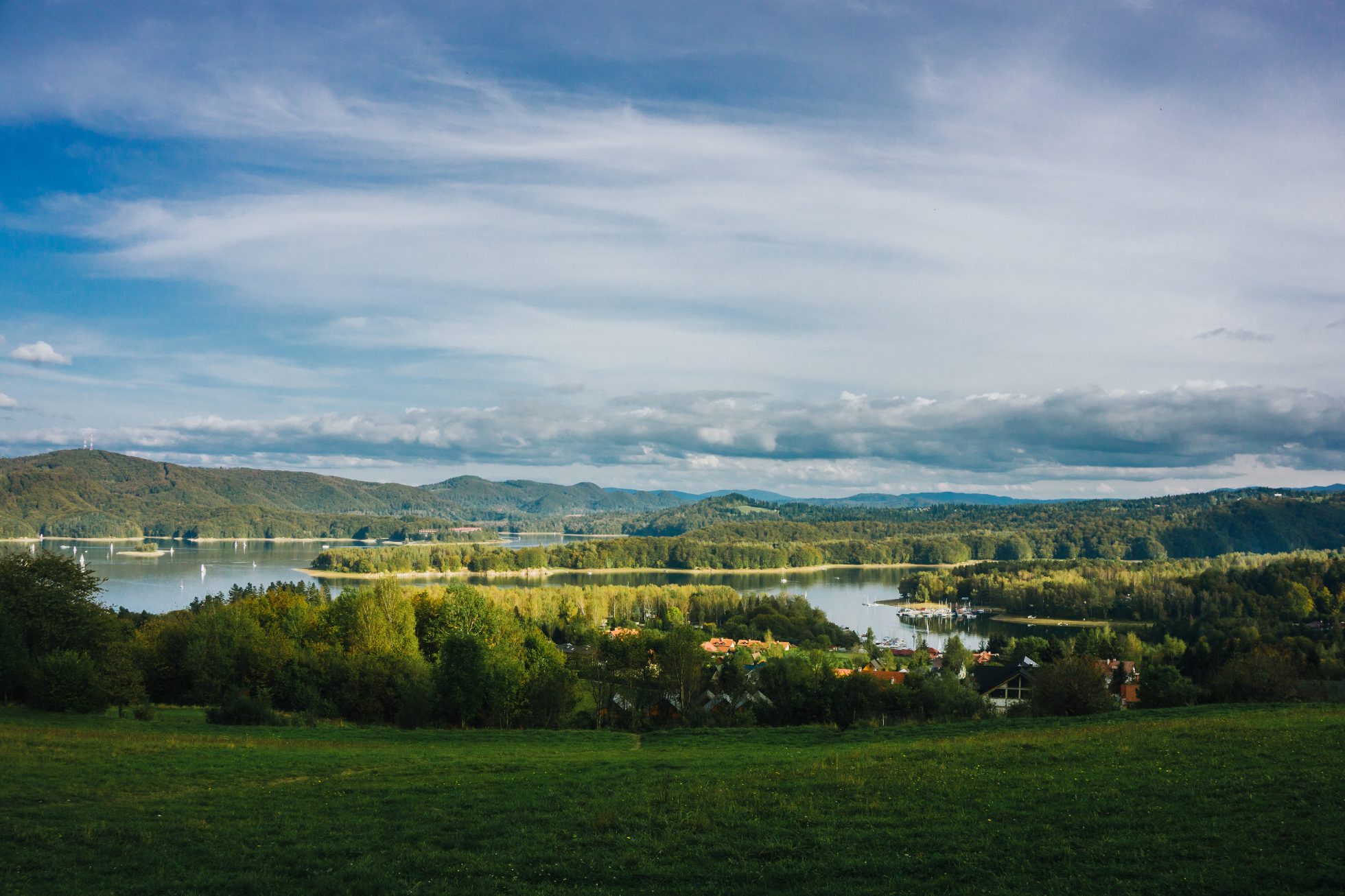 Green landscape by the water near Rzeszow, where to fly in June?