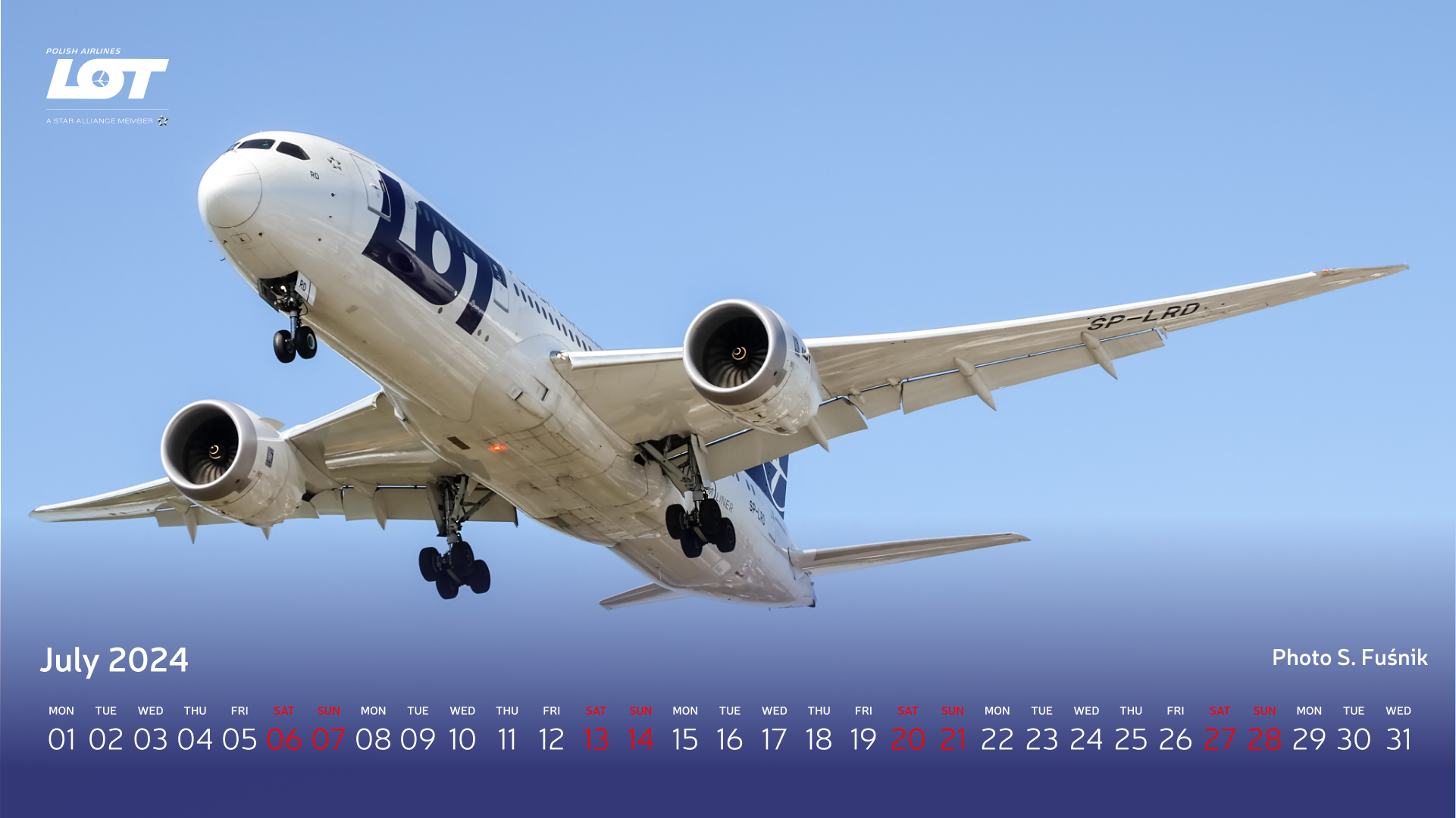 Passenger plane of LOT Polish Airlines against a clear sky.