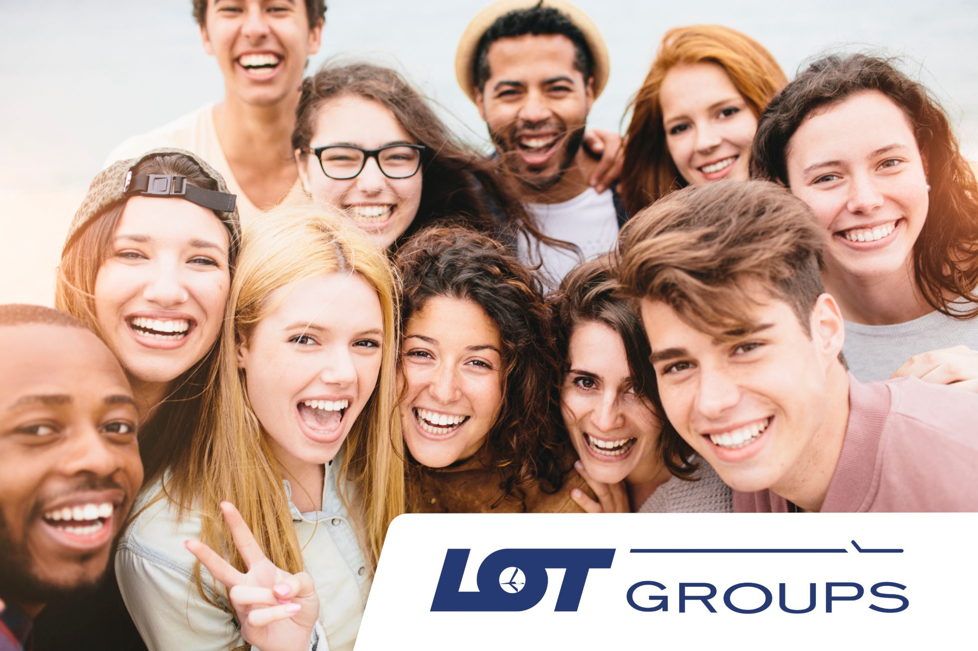 Large group of friends portrait at the beach