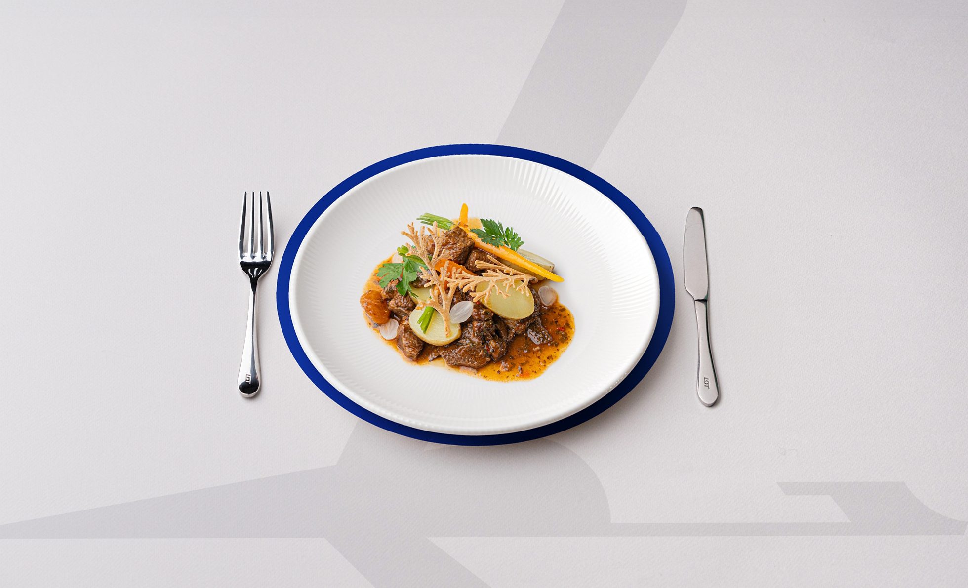 Beef bourguignon z młodymi ziemniakami i marchewkami