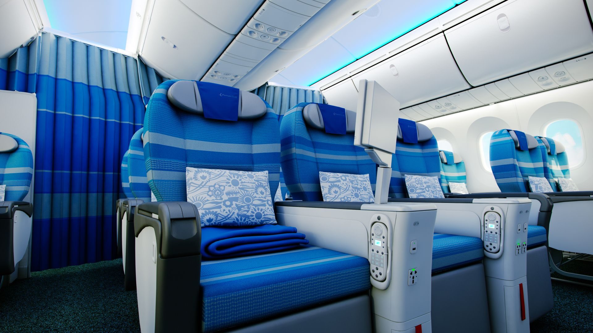 LOT Premium Economy - kabina z rzędem foteli, niebieską zasłonką i niebieskim podświetleniem sufitu w Boeing 787-8 Dreamliner