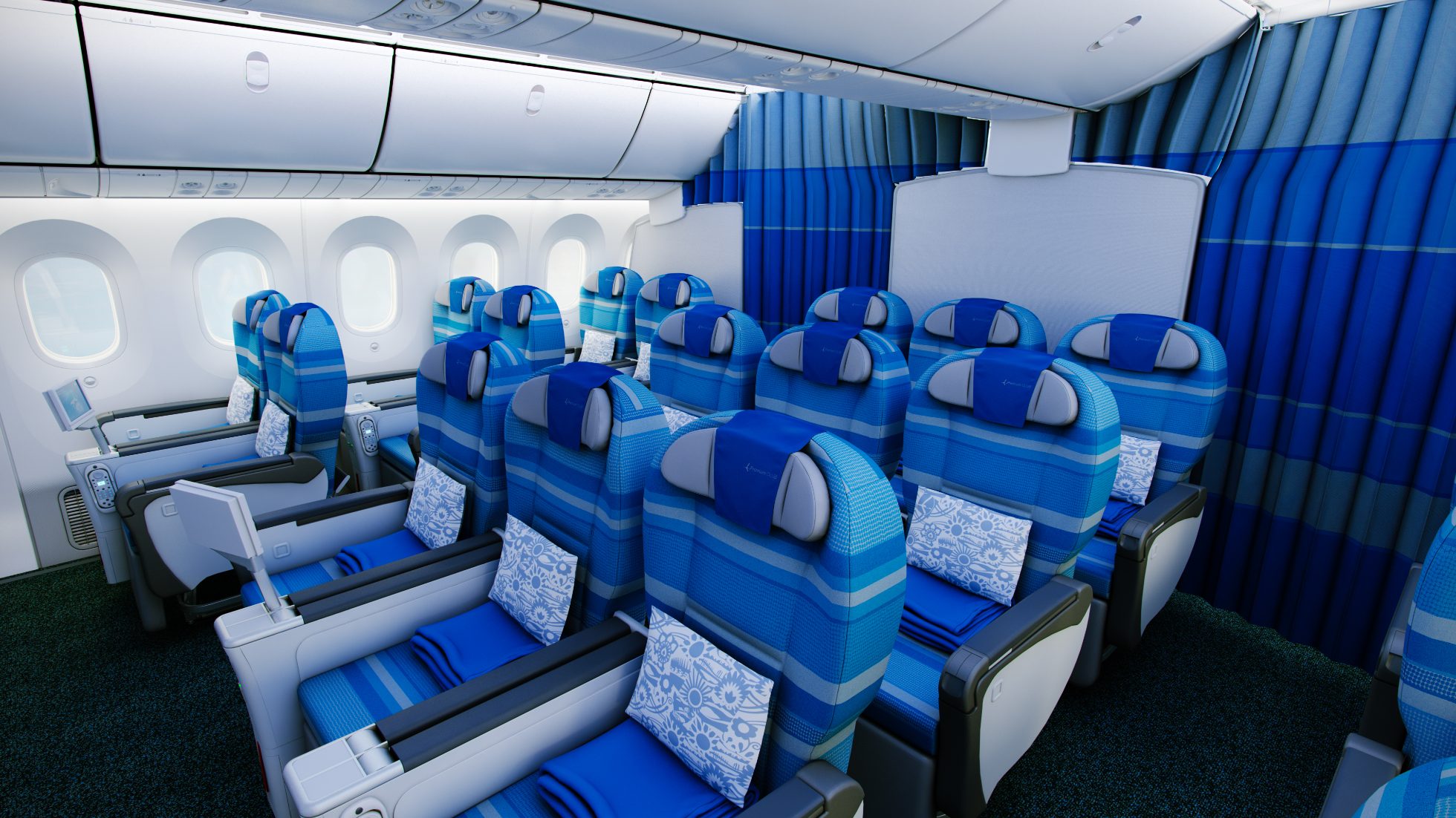 Kabina LOT Premium Economy w Boeing 787-8 Dreamliner - 3 rzędy foteli w układzie 2-3-2. Niebieska zasłonka i podświetlenie sufitu.